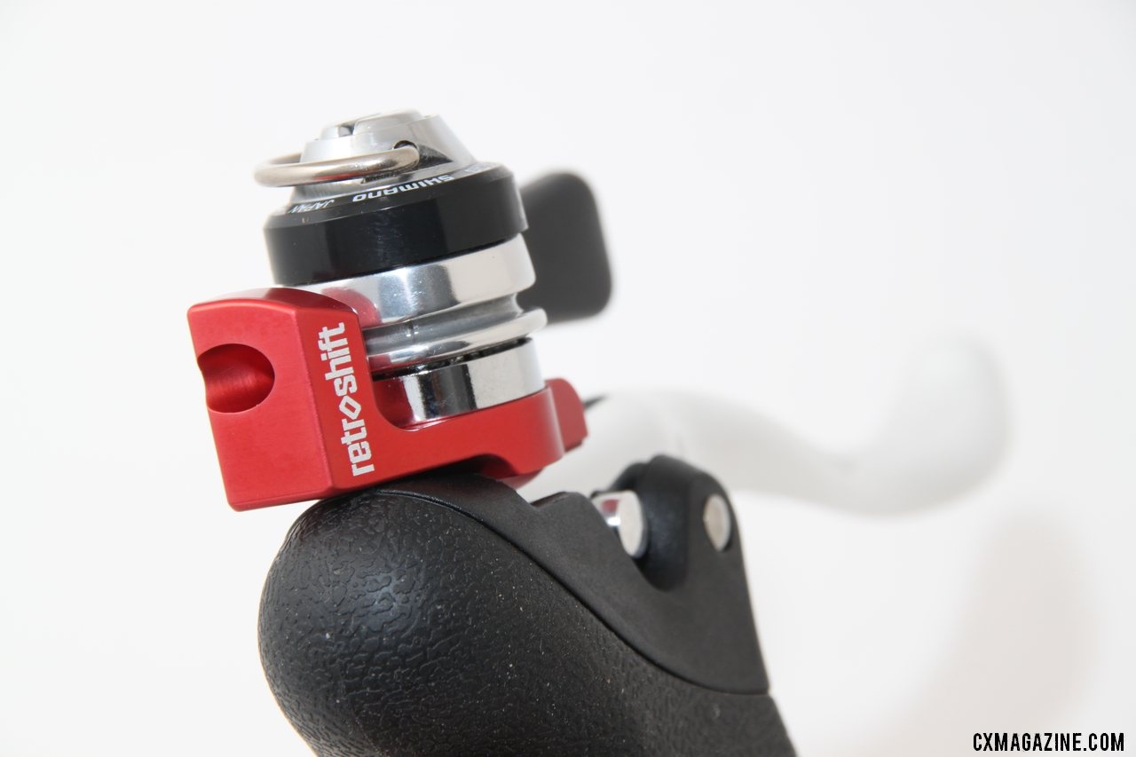 A simple, machined bolt-on mount adds a shifter to a Tektro brake lever.  © Cyclocross Magazine