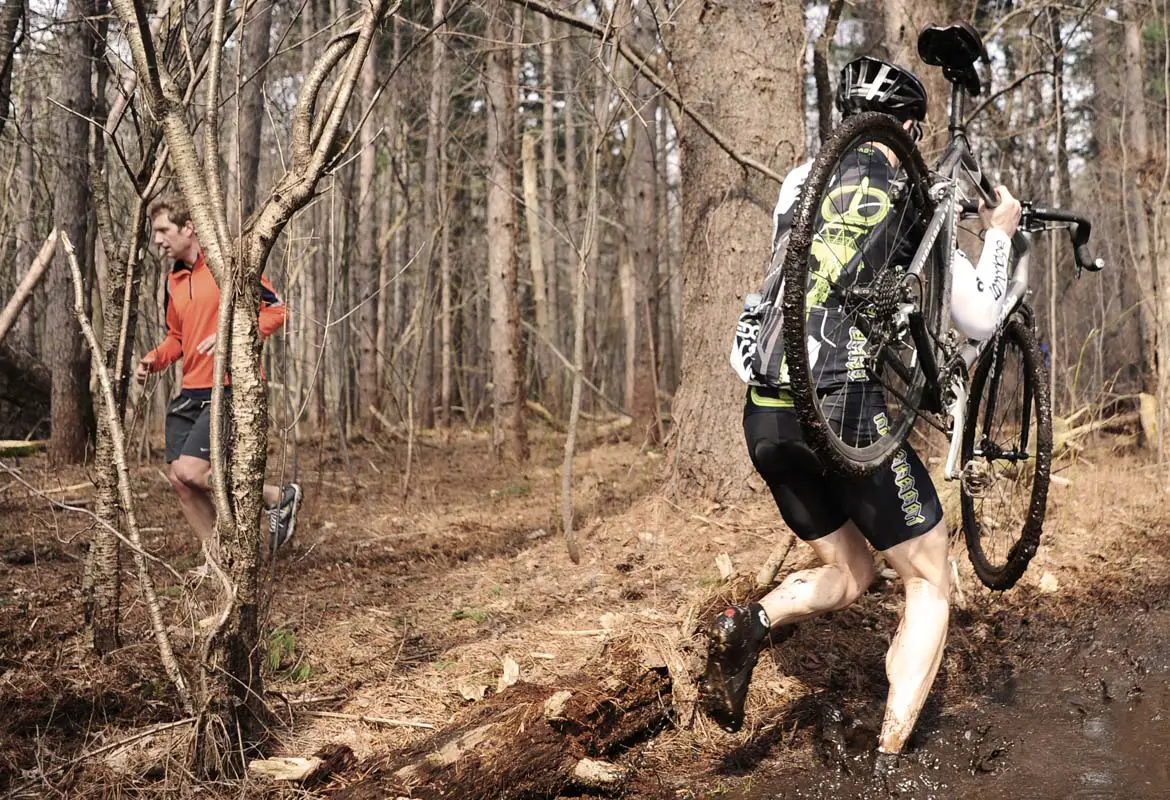 You have to wonder what the runner is thinking about the guy carrying the bike through the mud.? Natalia McKittrick