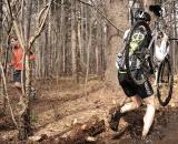 You have to wonder what the runner is thinking about the guy carrying the bike through the mud.? Natalia McKittrick