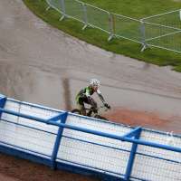 Sue Butler and the one-foot-deep puddle. by Cyril Guerin