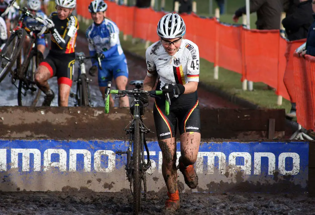 Elisabeth Brandau looks to be enjoying herself in the mud. ? Bart Hazen