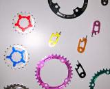 Home Brewed Components gets the gratuitous eye candy award for their array of anodized chainrings, ring guards, cogs and nut tuggers. Though not listed on his website, owner Dan Wilcox indicated that he?d be happy to make anodized chainring guards for up to 42 teeth rings in either 110 or 130 BCD sizes. ? Dave Lawson