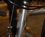 Winter uses a bilaminate head tube design in which the lug runs the entire height of the head tube on its rear side. This adds a considerable amount of strength for when you miscalculate your dismount and slam your front wheel into the barrier. ? Dave Lawson