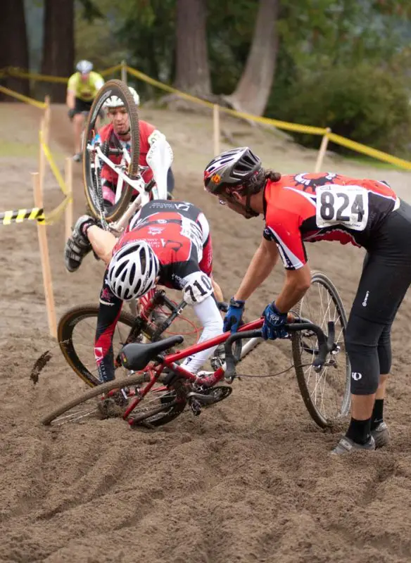 Two racers - Brian Wentz of Olympic Orthopaedic Associates and another - flip over the bars in short succession © Karen Johanson