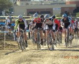 Riders barrel down the start at Campus Cross. © Kenneth Hill, Light and Shadow Photography