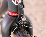 Studley's fork-mounted cable hanger on her Redline Conquest singlespeed keeps braking completely chatter-free. Sea Otter Classic Expo 2011. © Cyclocross Magazine