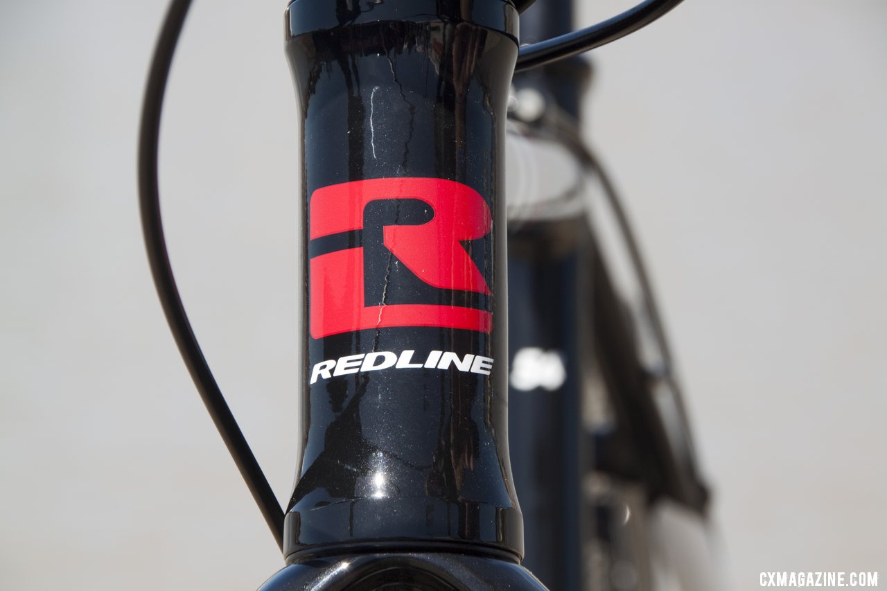 Redline\'s new bold head badge for 2013. Sea Otter 2012. ©Cyclocross Magazine