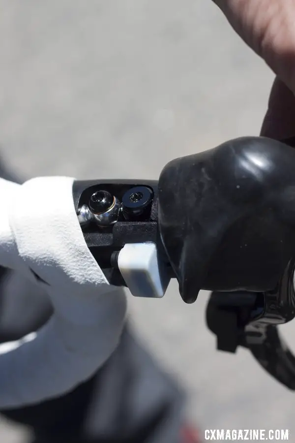 Under the hood, literally, of the TRP HyWire hydraulic disc brake Di2 lever.Sea Otter 2012. ©Cyclocross Magazine