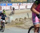 The women head up the hill at the start of the Sea Otter short track race 2013. © Cyclocross Magazine