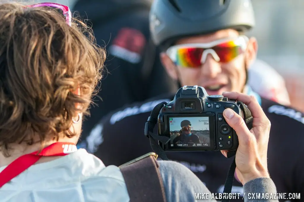 Interviewing Ben post-race during cyclocross at Sea Otter. © Mike Albright