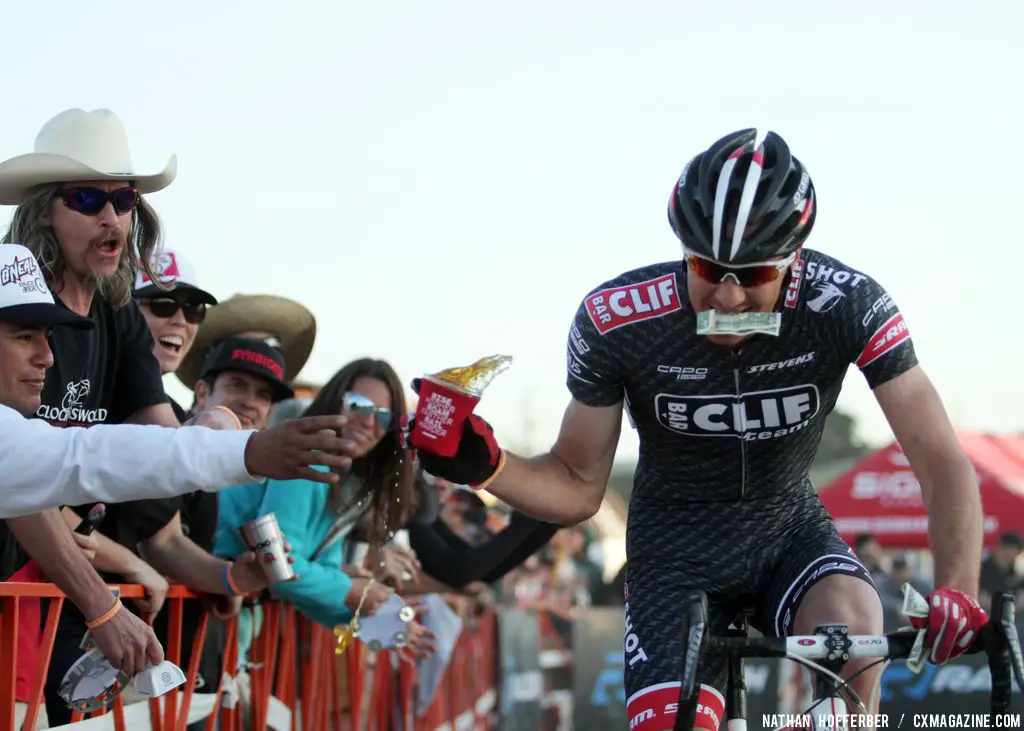 Snagging some extra cash at the Raleigh cyclocross race at Sea Otter. © Cyclocross Magazine