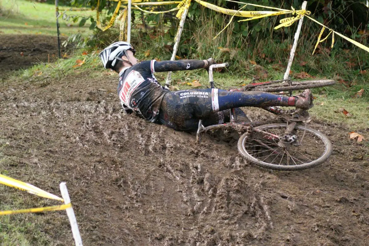 Alex Teltsine hits the deck on a tricky off-camber section © Kenton Berg