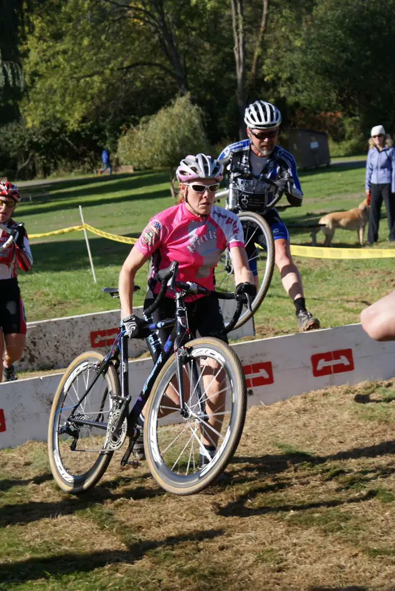 Women's elite winner Kari Studley navigates the barriers en route to her win. by Kenton Berg