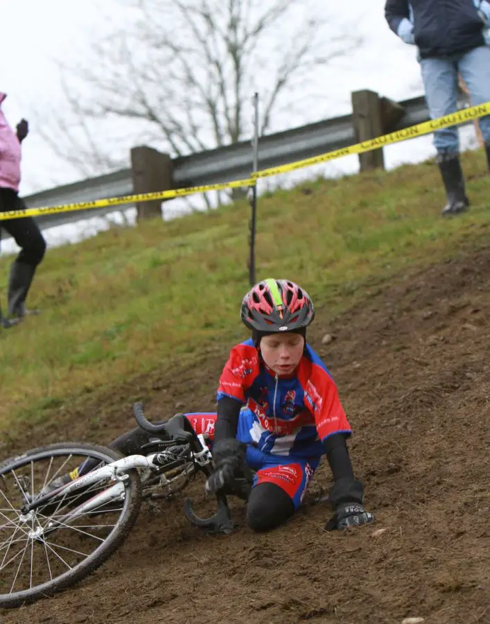 A junior goes down on one of the muddier sections© Janet Hill 