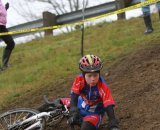 A junior goes down on one of the muddier sections© Janet Hill 