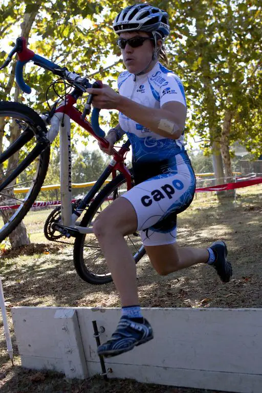 Jen Jordan (Sycomp Racing/Team Affinity) negotiates the plank barriers at Harry Renfree FieldSacramento Cyclocross Series