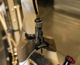 Six Eleven Bicycle Co.'s added a fork-mounted cable hanger to the Wound Up carbon cross fork.  NAHBS 2012. ©Cyclocross Magazine