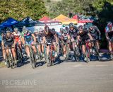 The Men’s A field leaps off the line at Udo Cross, dedicated to the late Udo Heinz. © Philip Beckman