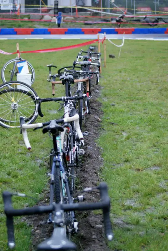 The drainage ditch doubled as a bike stand in the pits ©Kenton Berg