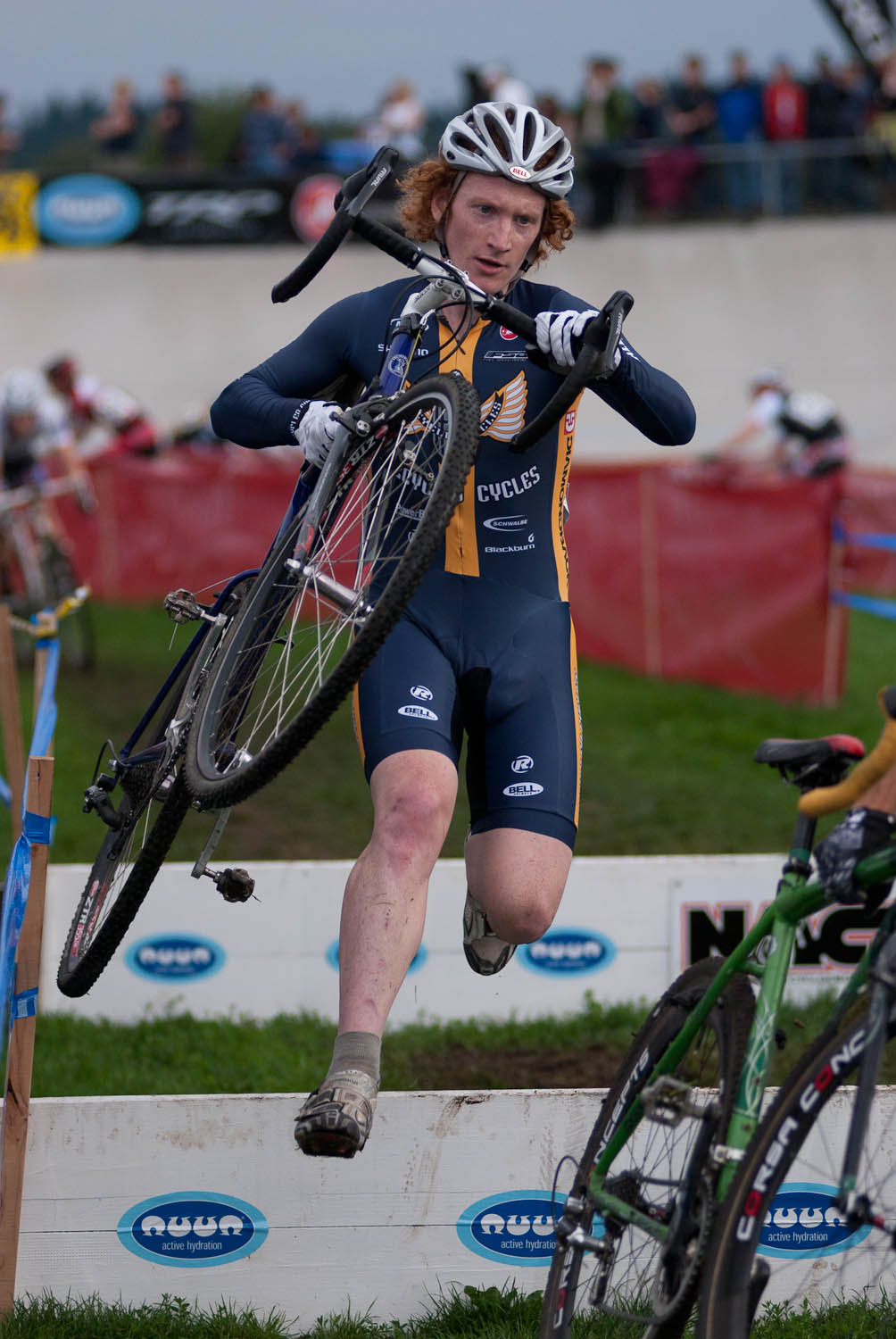 A masters cat 3 racer treats the barriers as though they\'re nothing. © Karen Johanson