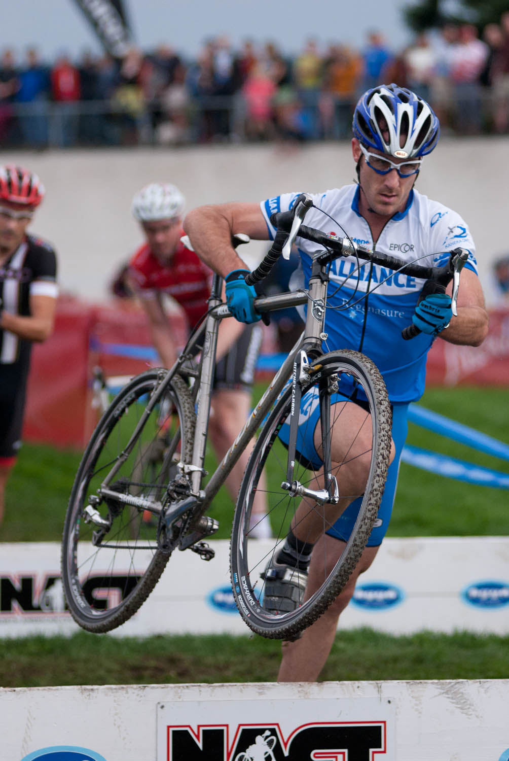 Masters cat 3 men leap over the barriers in one of the few moments at StarCrossed that wasn\'t rainsoaked. © Karen Johanson