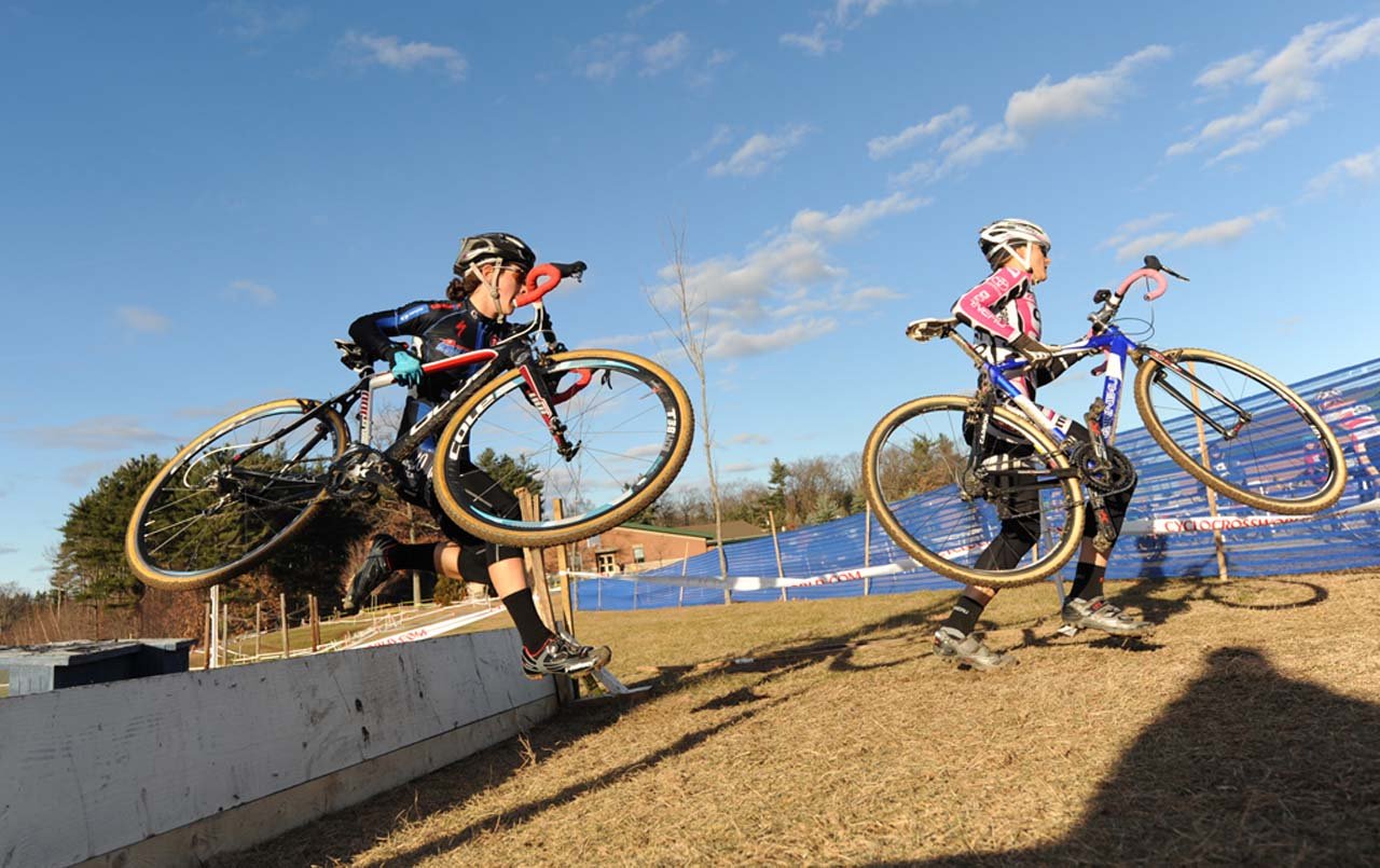 Elliott (Garneau Club/Chaussure/Ogilvy) and Arley Kemmerer (C3/Athletes Serving Athletes) through the hurdles ©Natalia Boltukhova | Pedal Power Photography | 2010