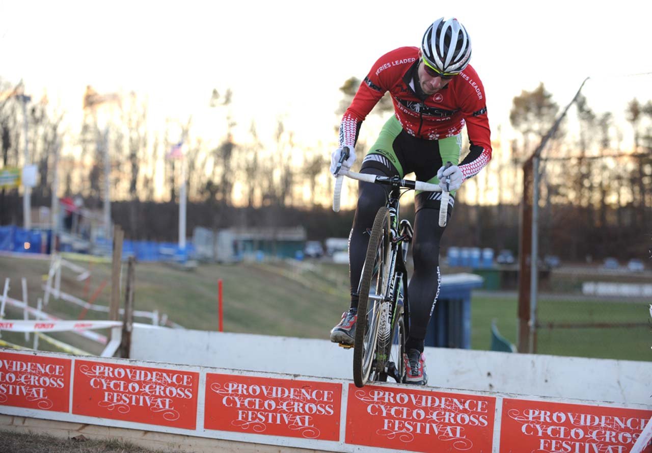 As the race went on, Powers (Cannondale p/b cyclocrossworld.com) showed a bit of flair and hopped the hurdles ©Natalia Boltukhova | Pedal Power Photography | 2010