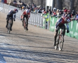 #4 Norm Kreiss looks back as his teammate Henery Kramer sprints in for 3rd in the Mens 55-59 race. ©Steve Anderson