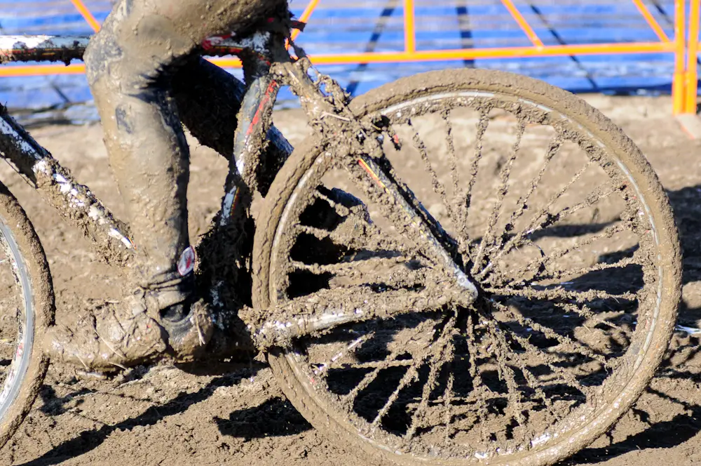 By Noon no bike was left without pounds of mud coated to every bike part. ©Steve Anderson