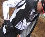The RS Vest mixes a blend of materials to create a windproof, waterproof, breathable vest perfect for the fall. One center zip pocket in the rear provides secure stowage for your coffee money to warm up those cold rides. Angled pockets flank the center pocket but aren't nearly as deep as traditional rear pockets © Kristie Hancock The RS Vest mixes a blend of materials to create a windproof, waterproof, breathable vest perfect for the fall. One center zip pocket in the rear provides secure stowage for your coffee money to warm up those cold rides. Angled pockets flank the center pocket but aren't nearly as deep as traditional rear pockets © Kristie Hancock