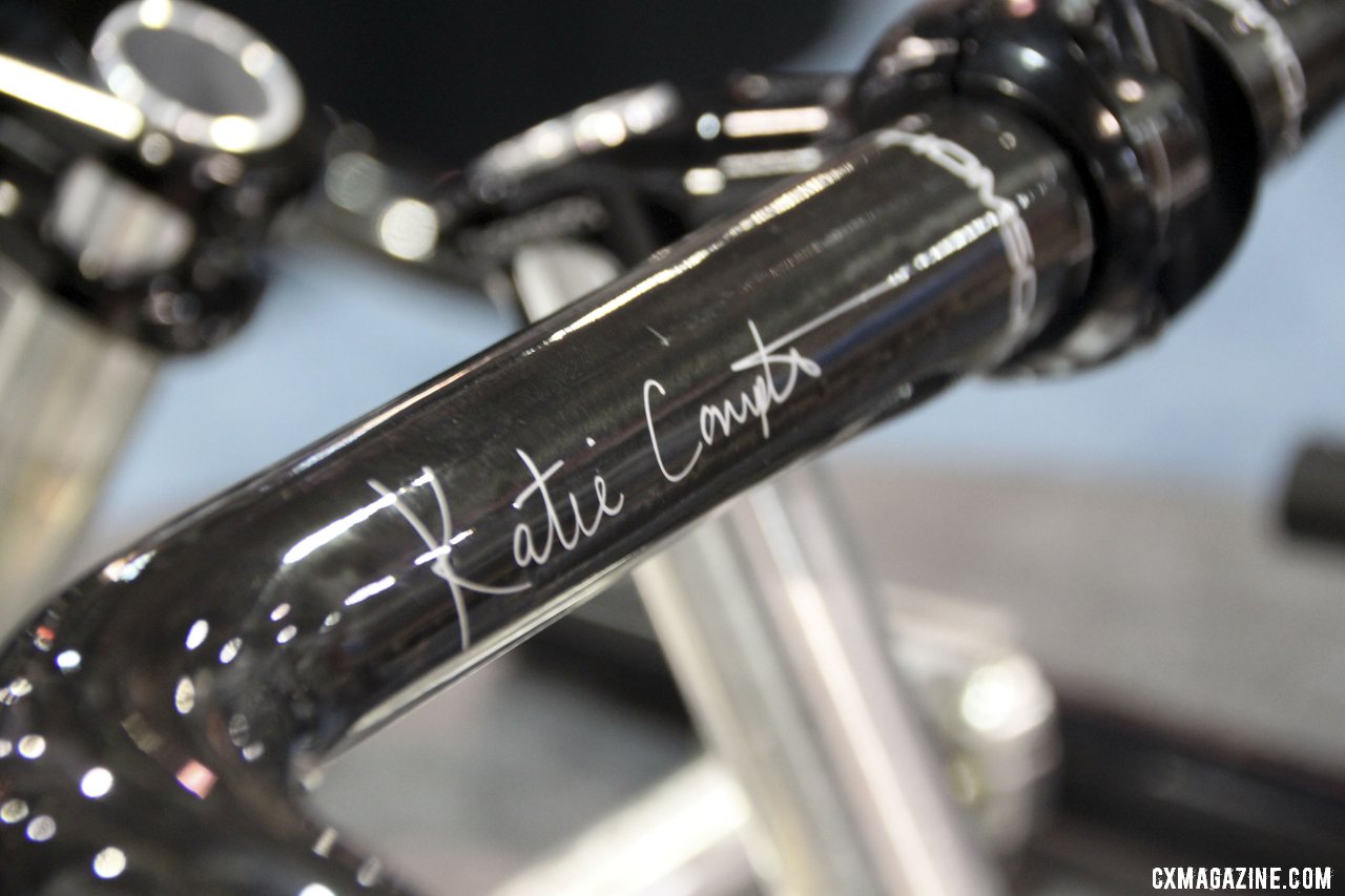 Katie Compton\'s new signature handlebar: Thomson\'s KFC One carbon bar, with dual cable housing slots on the underside of the bara. ©Cyclocross Magazine