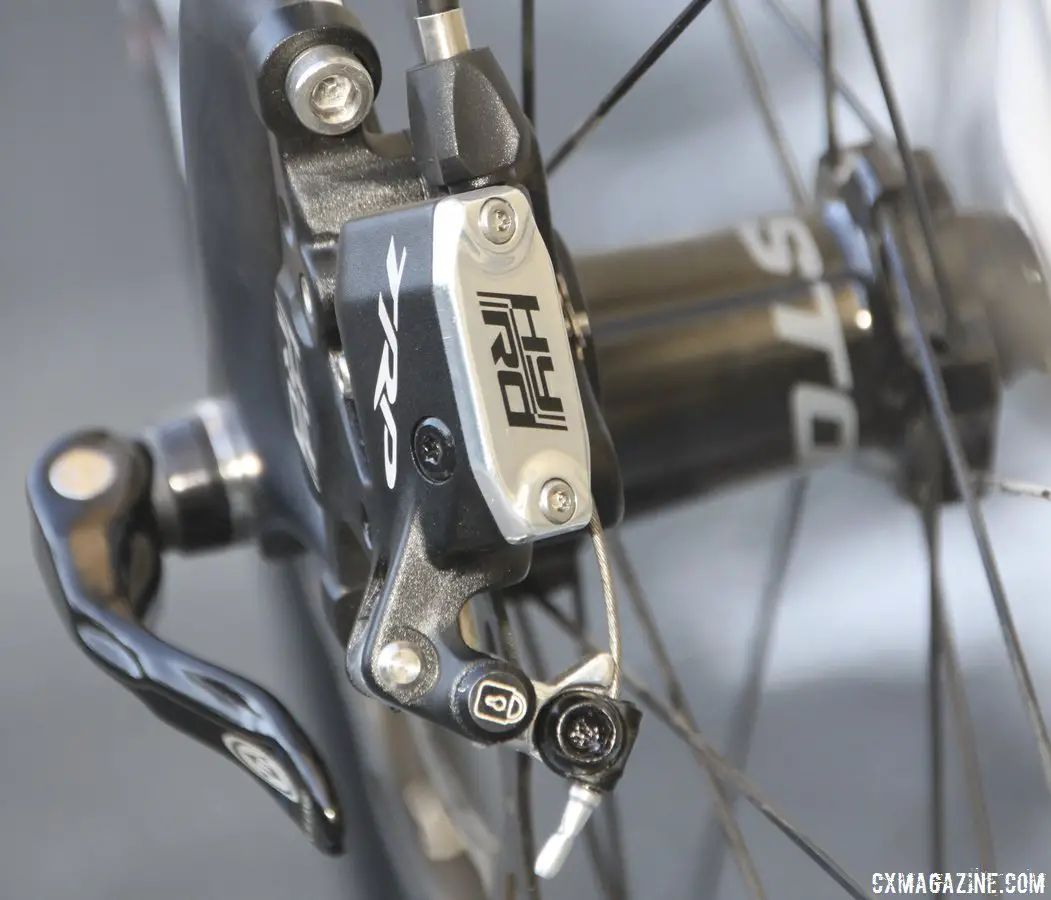 The TRP HY-RD cable-actuated hydraulic disc brake features a locking thumbscrew to aid in setup and avoid accidental piston displacement when a wheel and rotor aren\'t in place. © Cyclocross Magazine