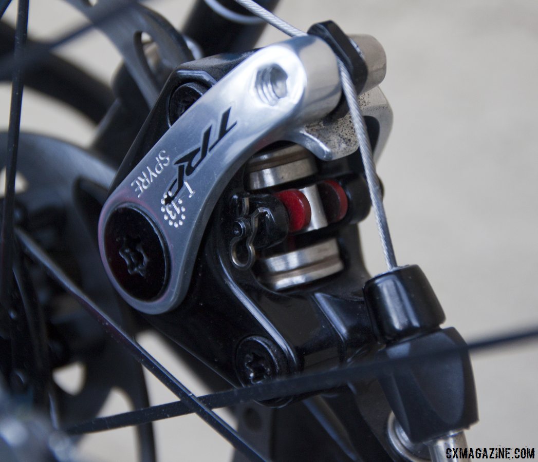 A circlip allows pad removal on the TRP Brakes\' Spyre Mechanical Disc Brake. © Cyclocross Magazine