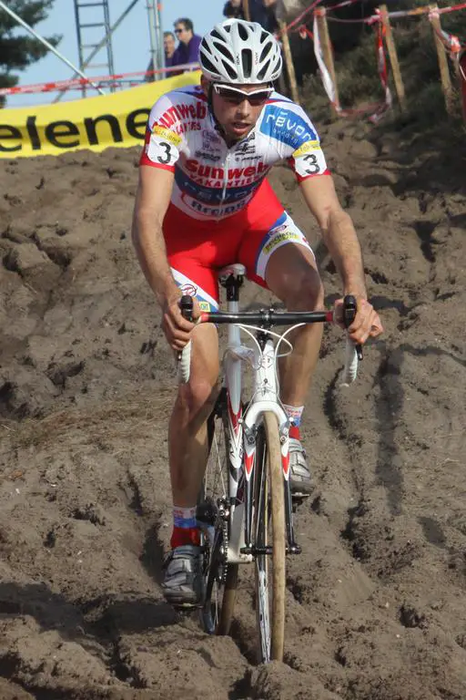Vinnie Braet fights to control his bike through the mud. © Bart Hazen