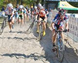 The winning move of the Women’s UCI race took place less than two minutes after the start as Katie Compton gapped the field on their first trip through the sand barrier © 2010 Jeffrey B. Jakucyk