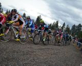 The women hit turn number 1 en masse. © Cyclocross Magazine