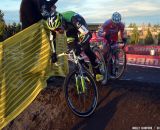 Driscoll takes the run-up smoothly while the rider behind him stumbles. © Cyclocross Magazine