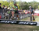 Driscoll flying over the barrier with Barden in pursuit. © Amy Dykema