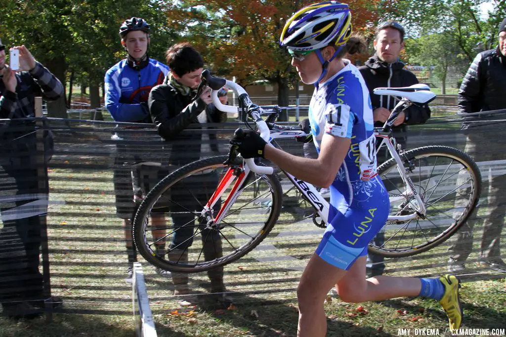 Georgia Gould charging through the barriers in one of the final laps. © Amy Dykema