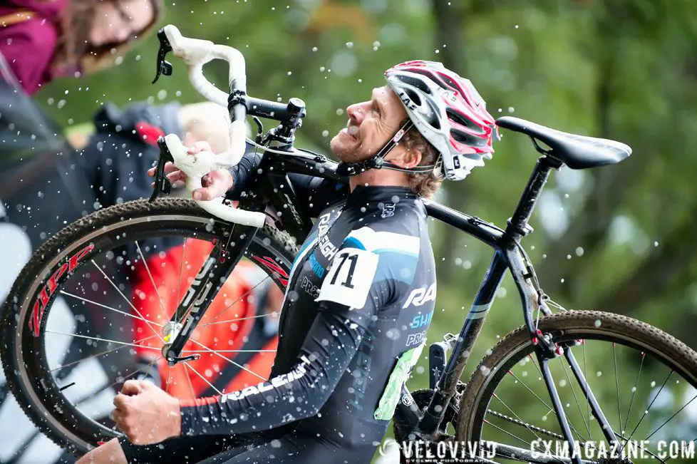 after taking a small sip from a beer hand-up, the crowd went wild and Johnny threw the beer down with great show where beer literally \'exploded\' out of the can. © VeloVivid Photography