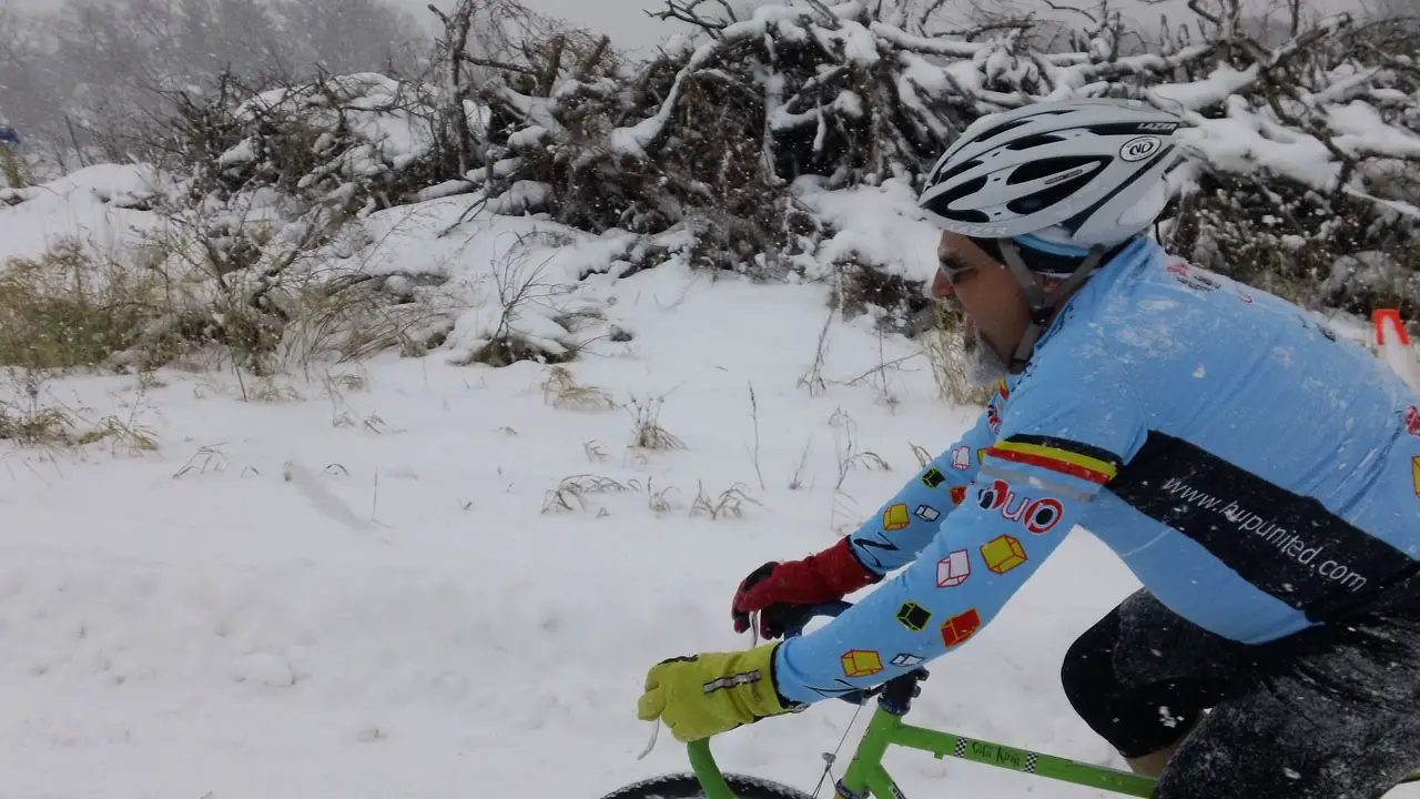 Mike Clark, Velo City bike shop owner, in the snow on Versluis Orchard ©Marc Dettman