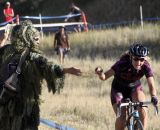 Taking a handup. Women's 2012 Raleigh Midsummer Night Cyclocross Race. @Cyclocross Magazine