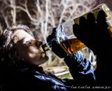 Spectators were more than happy to help drain the bourbon bottles on course. © Matthew Lasala