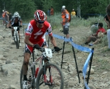 Ned Overend uses his top-notch handling skills to fly through the rock garden. ©Amy Dykema