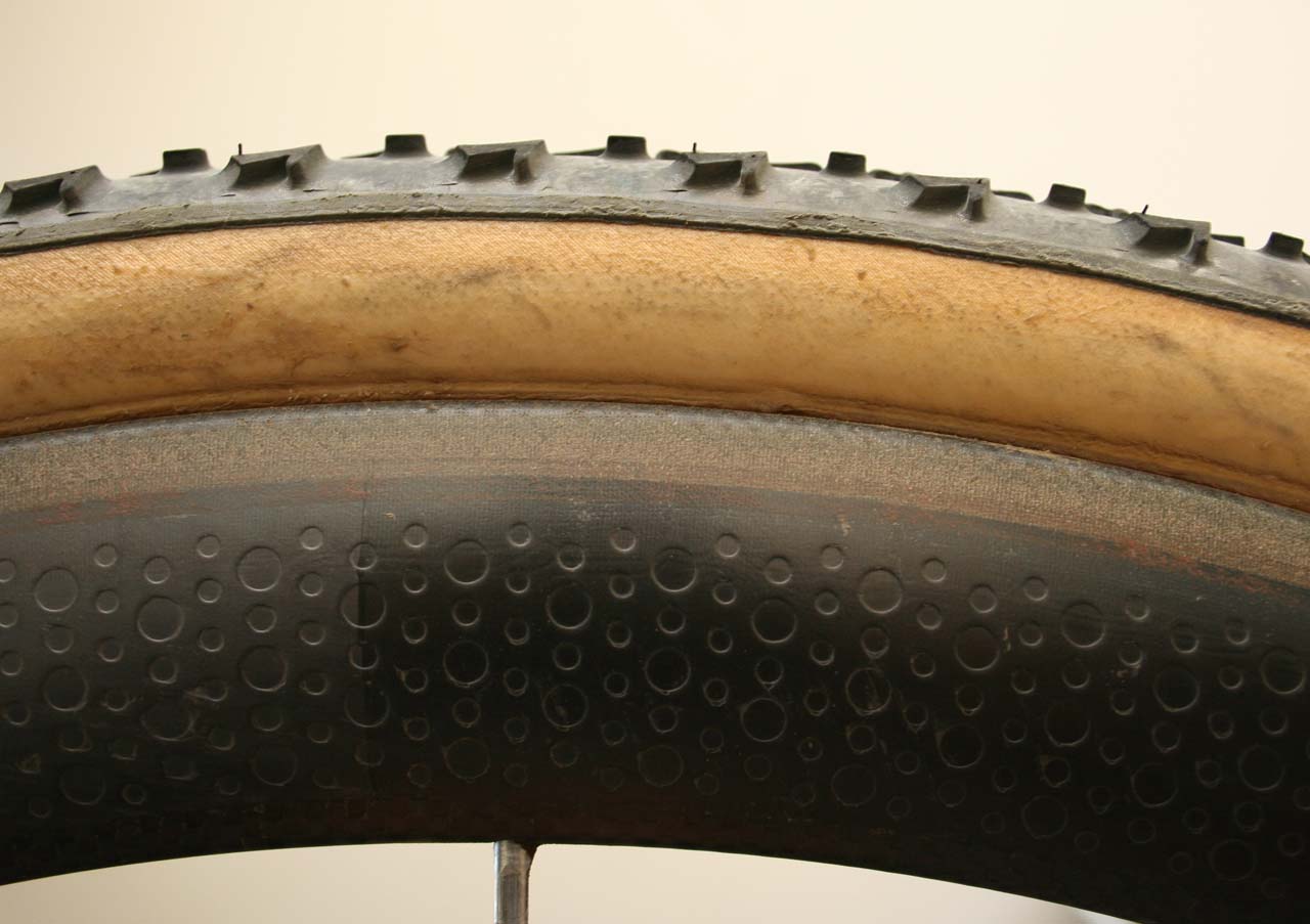 The 303\'s wider rim provides extra gluing surface area and almost covers the entire base tape. ? Cyclocross Magazine 