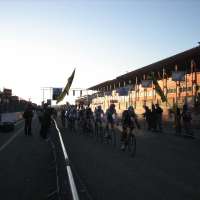 Chase group behind the leaders at sunset.