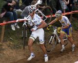 The world champion shoulders his bike.  © Bart Hazen