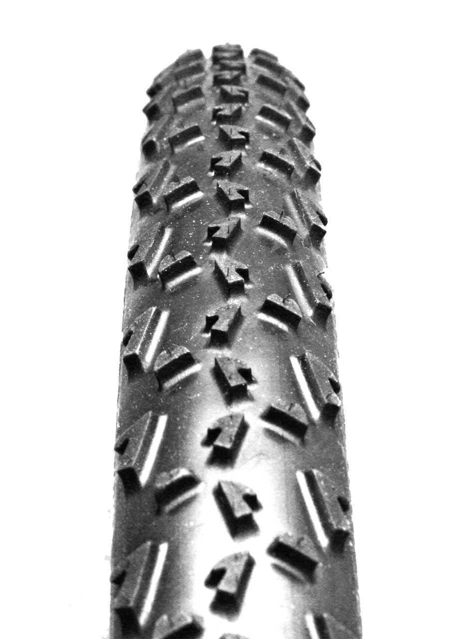 Dugast Rhino tubular (L) and green Michelin Mud clincher (R) cyclocross tires. © Cyclocross Magazine