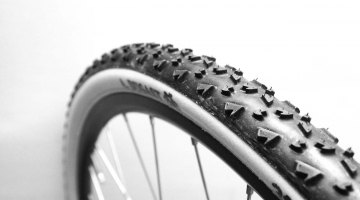 Cyclocross tires, like this Dugast, are narrow with dirt tread
