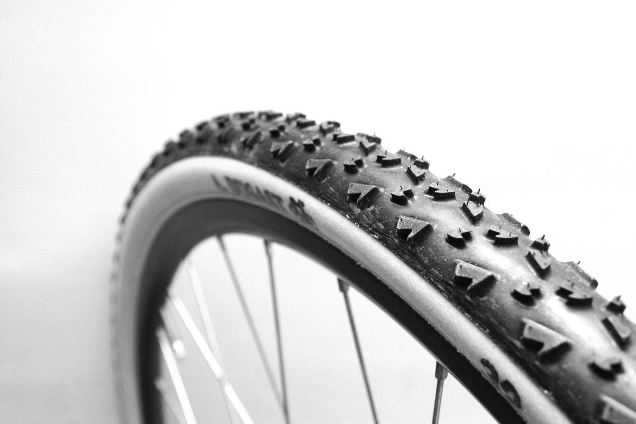 Cyclocross tires, like this Dugast, are narrow with dirt tread